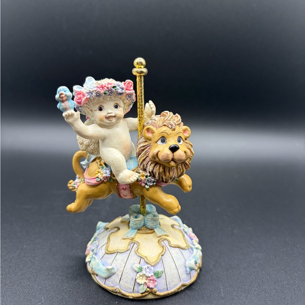 Whimsical 2000's Cherub and Lion Carousel Figurine